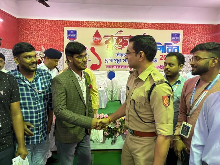 TDO team interacting with guests at a seminar
