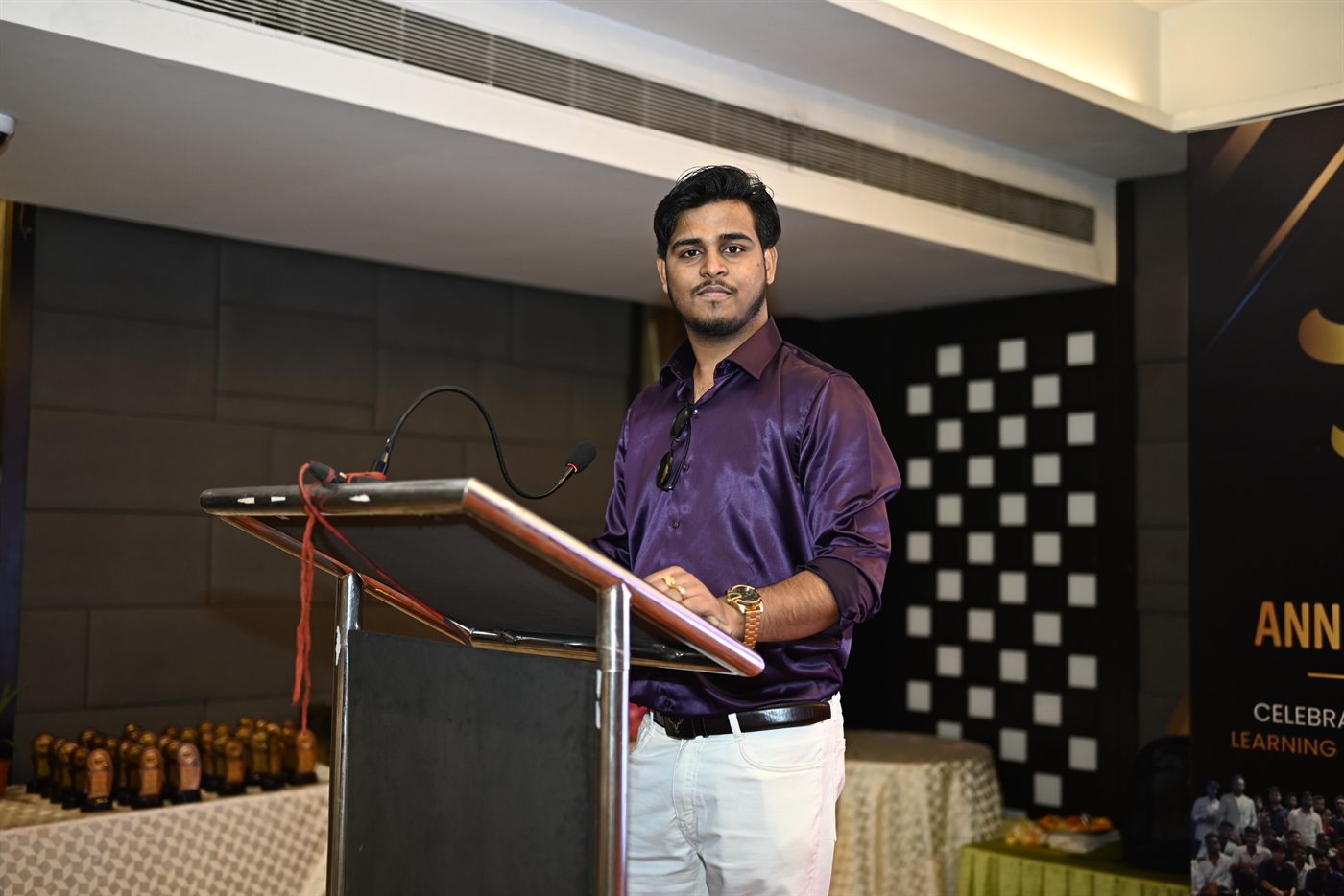 Roshan Burnwal speaking at a professional event